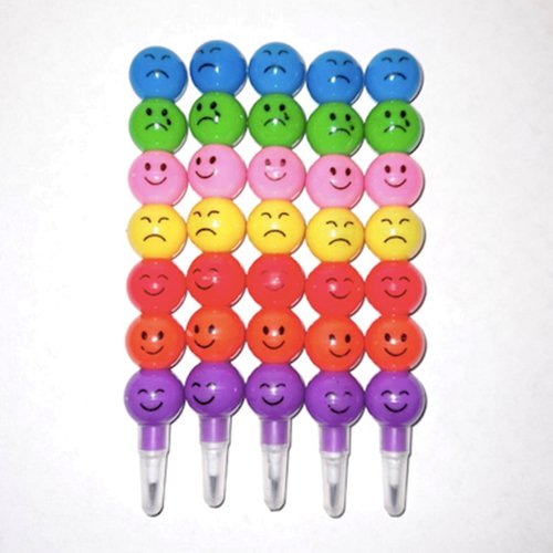 Portaminas mina negra con caritas de colores variados. Caja x 1.800 unidades